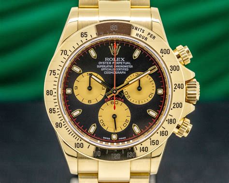 rolex daytona yellow gold black dial